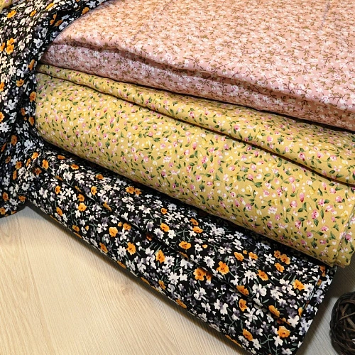 Штапель принт "Оранжевые цветочки на черном фоне"