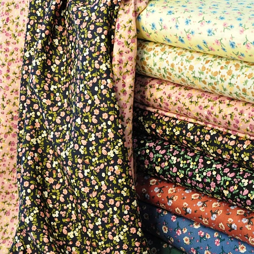 Штапель принт "Мелкий цветочек на синем фоне"