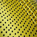 Атлас тонкий принт (желтый фон черный горох 1см)