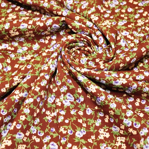 Штапель принт фиреневые  цветочки на коричневом фоне