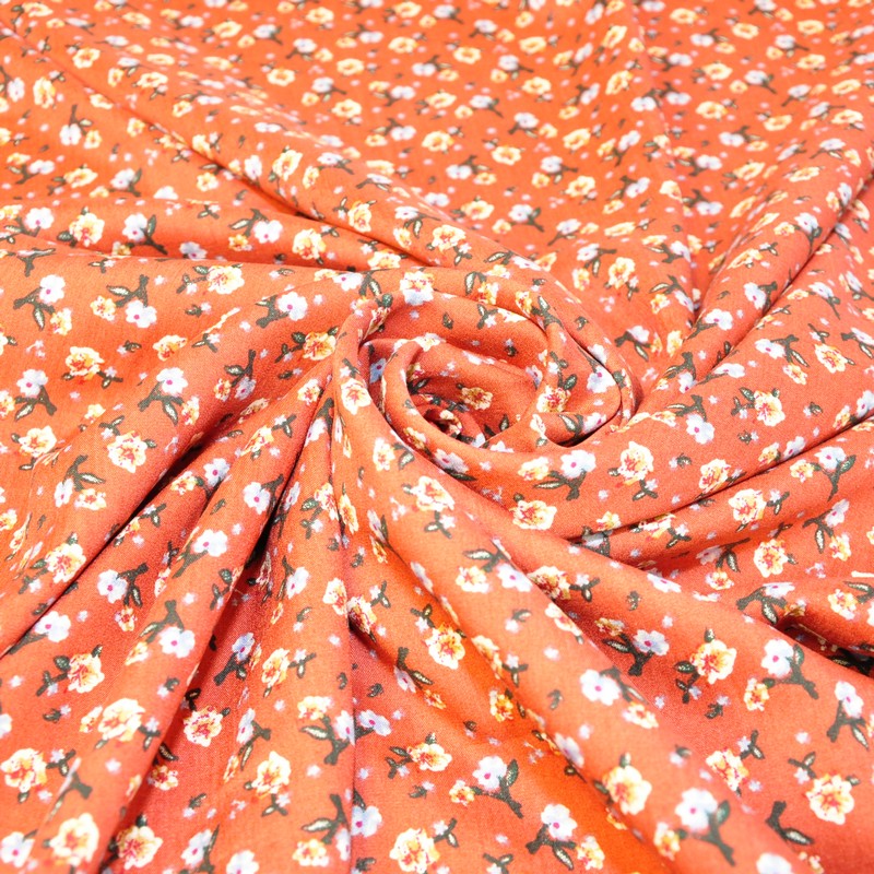 Штапель принт "Мелкий цветочек на теракотовом фоне " скидки на ткани в Минске оптом и в розницу | Трикотаж tais.by