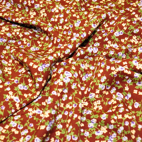 Штапель принт фиреневые  цветочки на коричневом фоне